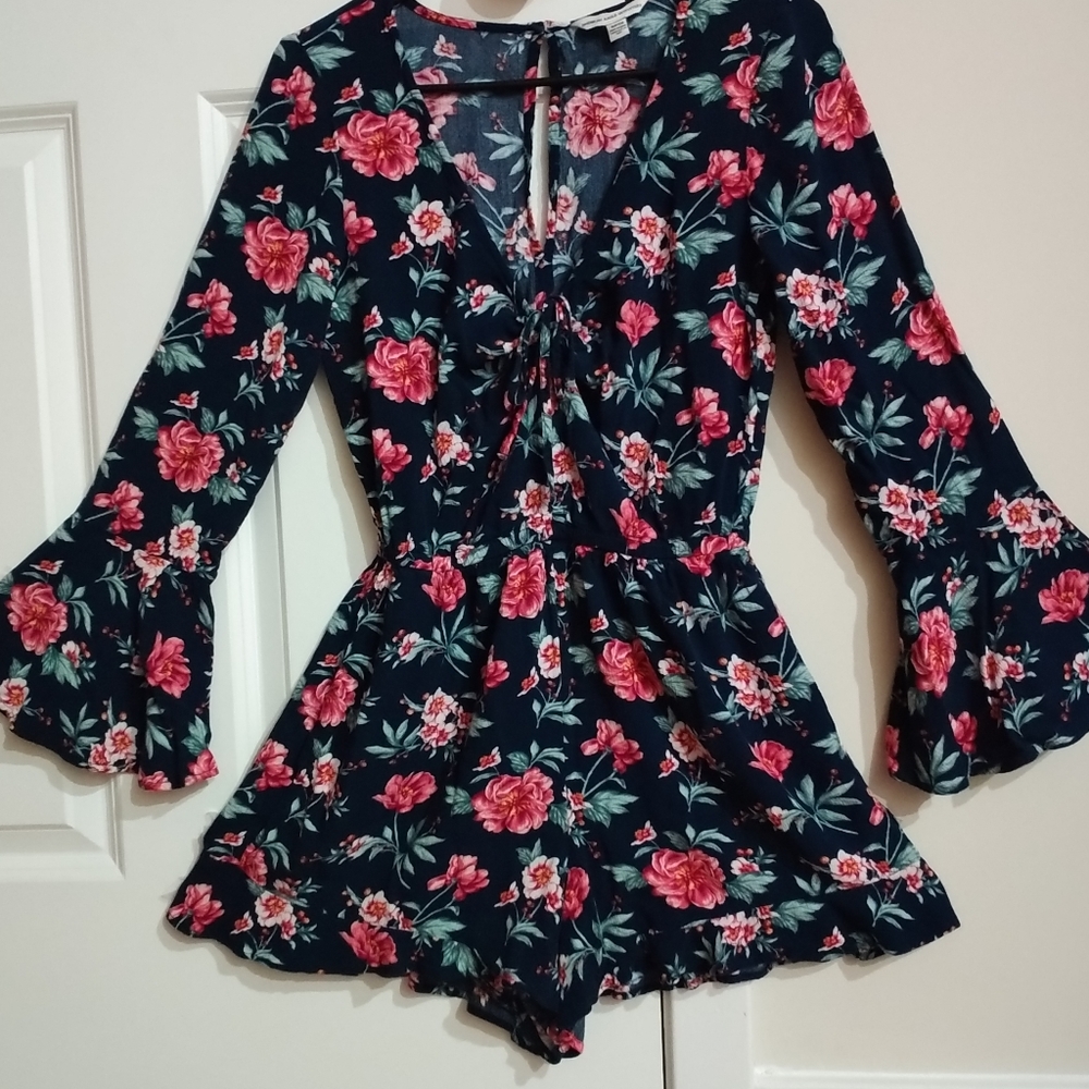 Plunging front tie long sleeve romper